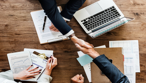 12_7_business-people-shaking-hands-together (1).jpg